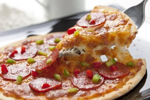 Slice of pepperoni pizza Foto stock