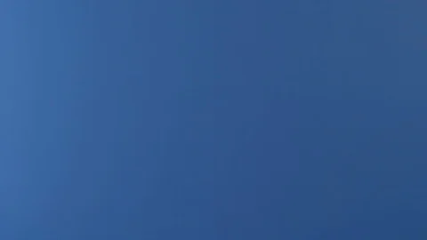 A slice of pepperoni pizza is seen flying through the air in slow motion. Video stock 126685094