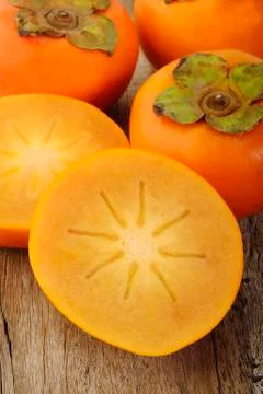 Slice persimmon fruit Stock Photos