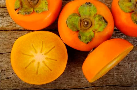 Slice persimmon fruit Stock Photos