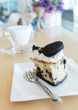 Slice piece of cake with chocolate cookie Foto stock