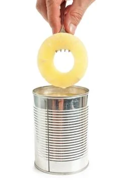 Slice of pineapple on a fork Stock Photos