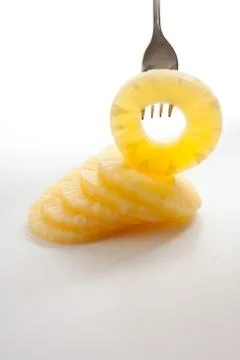 Slice of pineapple Stock Photos