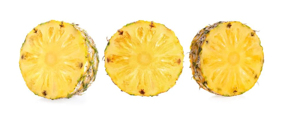 Slice pineapple on white Stock Photos