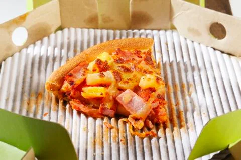 Slice of pizza  in the box Stock Photos