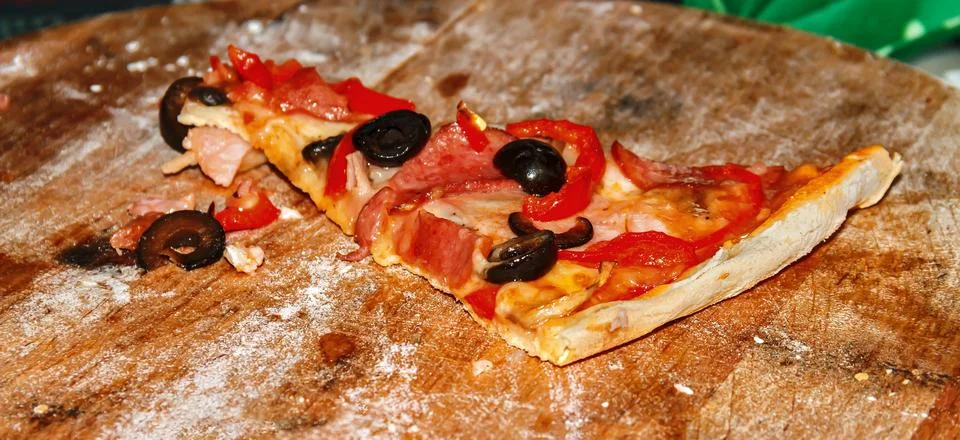 Slice of pizza Stock Photos