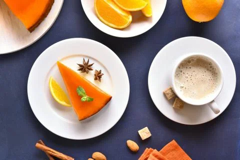 Slice of pumpkin pie and cup of coffee Stock Photos