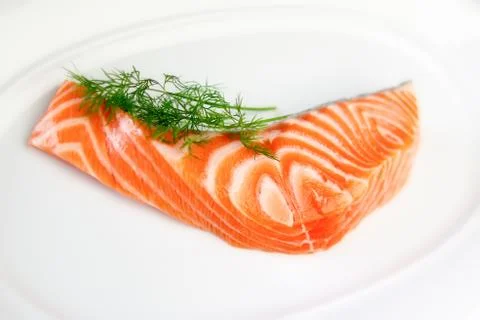 Slice of raw salmon Stock Photos