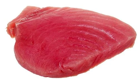 Slice of raw tuna fish meat isolated on white Stock Photos