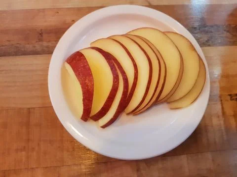 Slice red apple Stock Photos