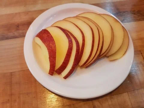 Slice red apple Stock Photos