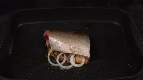 Slice of red fish fried in deep pan. Stock Footage 111074386