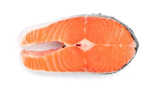 Slice of red fish salmon isolated on white background. Top view Stock Photos