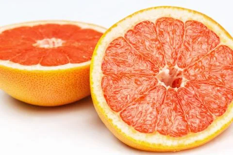 Slice of red grapefruit 스톡 사진