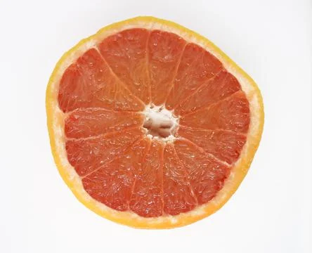 A slice of red grapefruit Stock Photos
