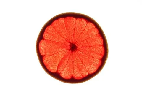 Slice of red grapefruit Slice of ripe ruby grapefruit on white background ... Stock Photos