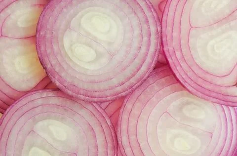 Slice of red onion, isolated Stock Photos