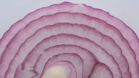Slice red onion rotation Stock Footage 129229828
