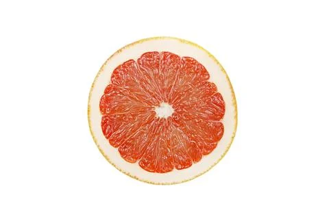 A slice of red ripe grapefruit isolated on a white background. Stock Photos