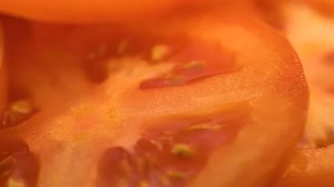 Slice of red tomato macro shooting Stock Photos