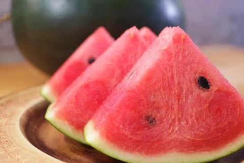 Slice of red watermelon, a delicious fruit that promote many aspects of health Stock Photos