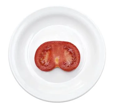 Slice of ripe tomato in plate slice of tomato in plate isolated on white C... Stock Photos
