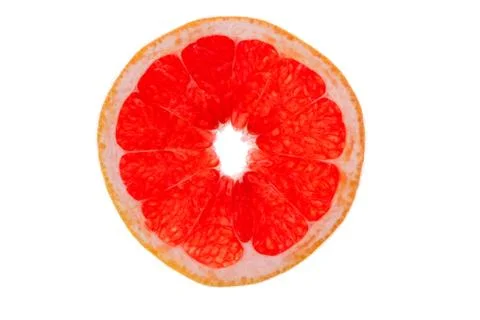 Slice of ruby grapefruit on white Stock Photos