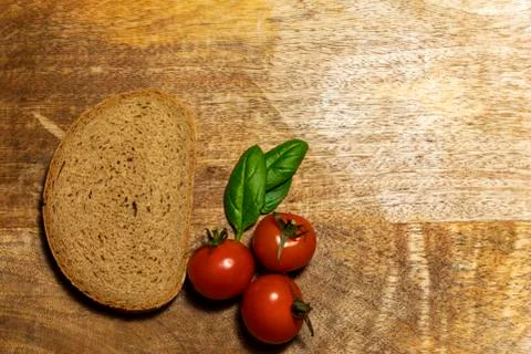 Slice of rye bread and vegetables Stock Photos