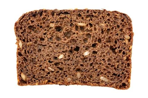 Slice of rye bread with seeds on a white background. Homemade baking. Bread.. Foto stock