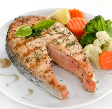 Slice of salmon and vegetables Stock Photos