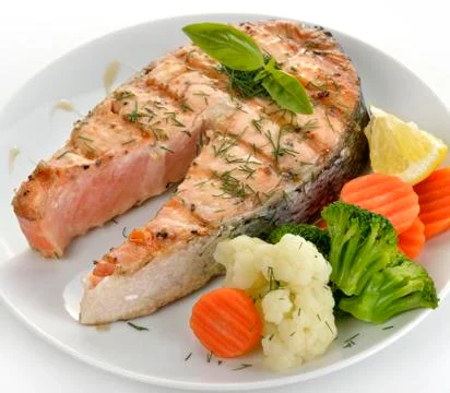 Slice of salmon and vegetables Stock Photos
