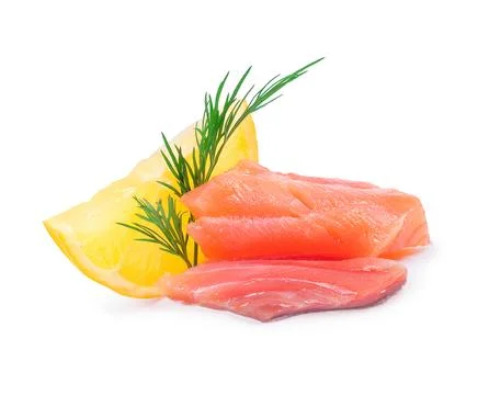 Slice of salmon with a slice of lemon close-up on a white background Stock Photos
