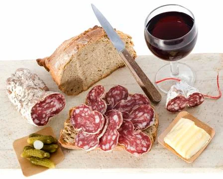 Slice of saucisson Stock Photos