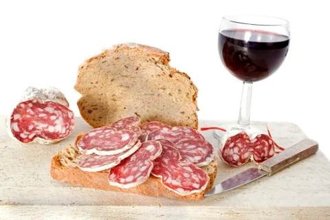 Slice of saucisson Stock Photos