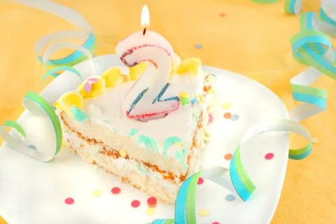 Slice second birthday cake Foto stock