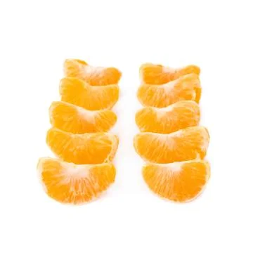 Slice sections of tangerine isolated over the white background Stock Photos
