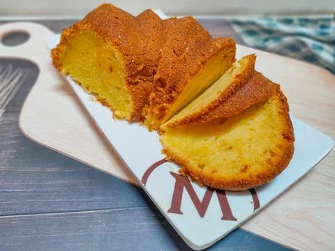 Slice of sponge cake on a plate 스톡 사진