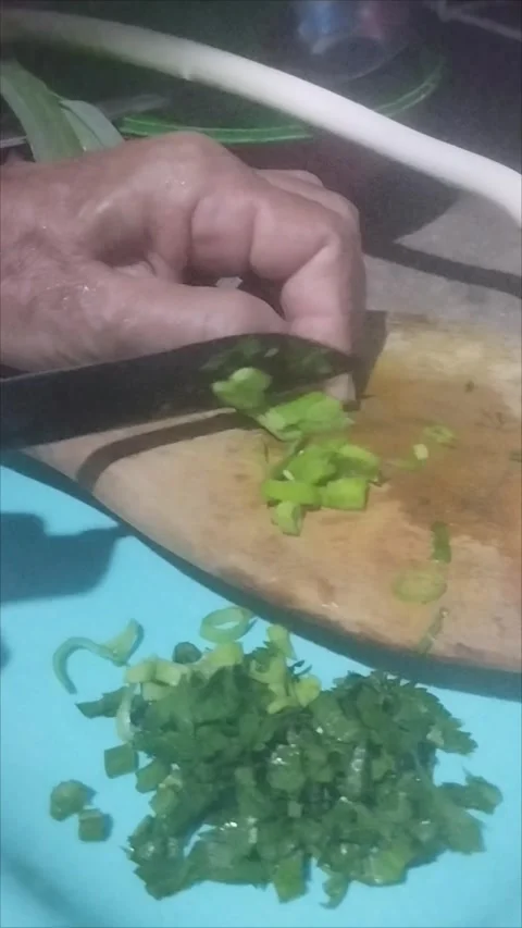 Slice the spring onions Stock Footage 290984996