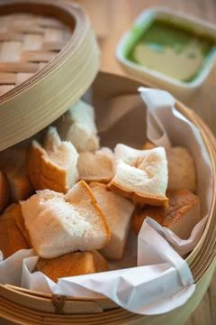 Slice steamed bread and pandan custard, Thai dessert. Stock Photos