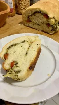 Slice of stuffed bread on a plate Stock Photos