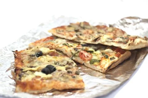 Slice of stuffed pizza Stock Photos