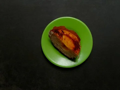 A slice of sweet bread with sweet jam filling Stock Photos