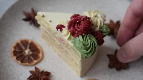 A slice of sweet layered cake with white cream for a birthday or holiday. A slic Stock Footage 324674939
