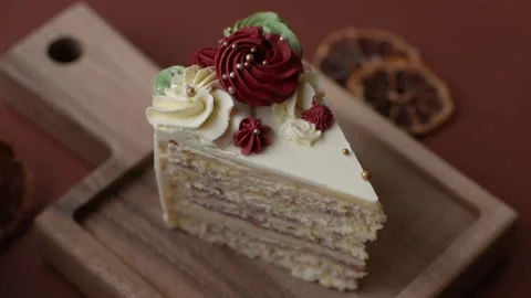 A slice of sweet layered cake with white cream for a birthday or holiday. A slic Stock Footage 324674953