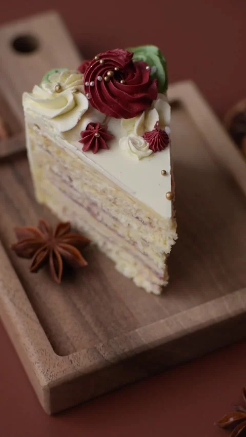 A slice of sweet layered cake with white cream for a birthday or holiday. A slic Stock Footage 324674959