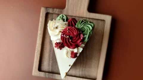 A slice of sweet layered cake with white cream for a birthday or holiday. A slic Stock Footage 324675083