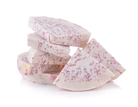 Slice taro root on white background Stock Photos