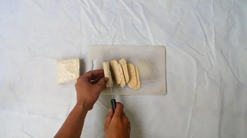 Slice tempe, food from soybean Stock Footage 120428023