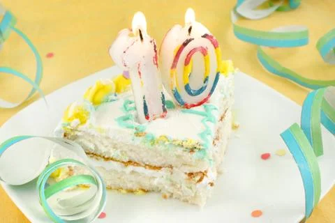 Slice of tenth birthday cake Stock Photos