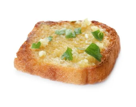 Slice of toasted bread with garlic and herb on white background Stock Photos
